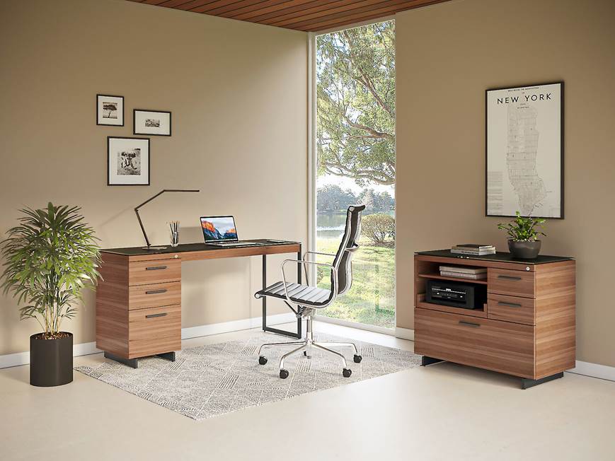 Office with desk, cabinet, and chair in a bright room