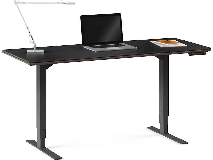 Close-up of desk edge with integrated control
