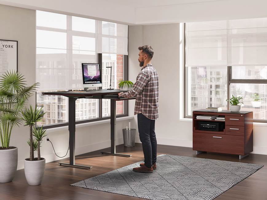 Desk with computer and cabinet