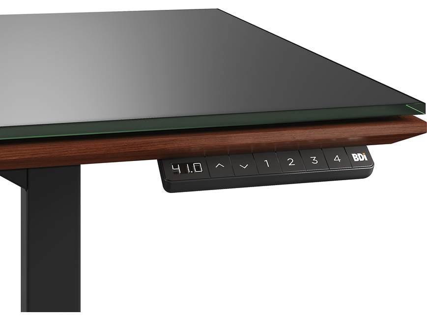 Close-up of desk edge and control panel