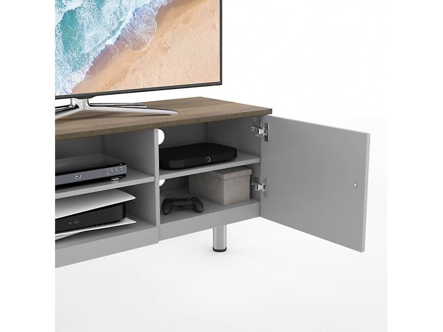 Open cabinet doors revealing storage inside