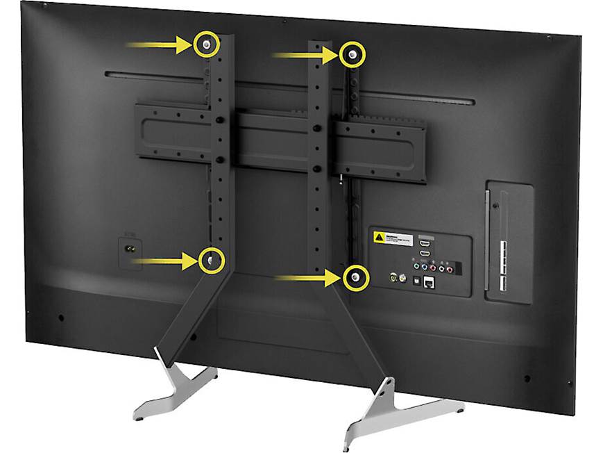 Back view of a television with mounting hardware highlighted with yellow circles